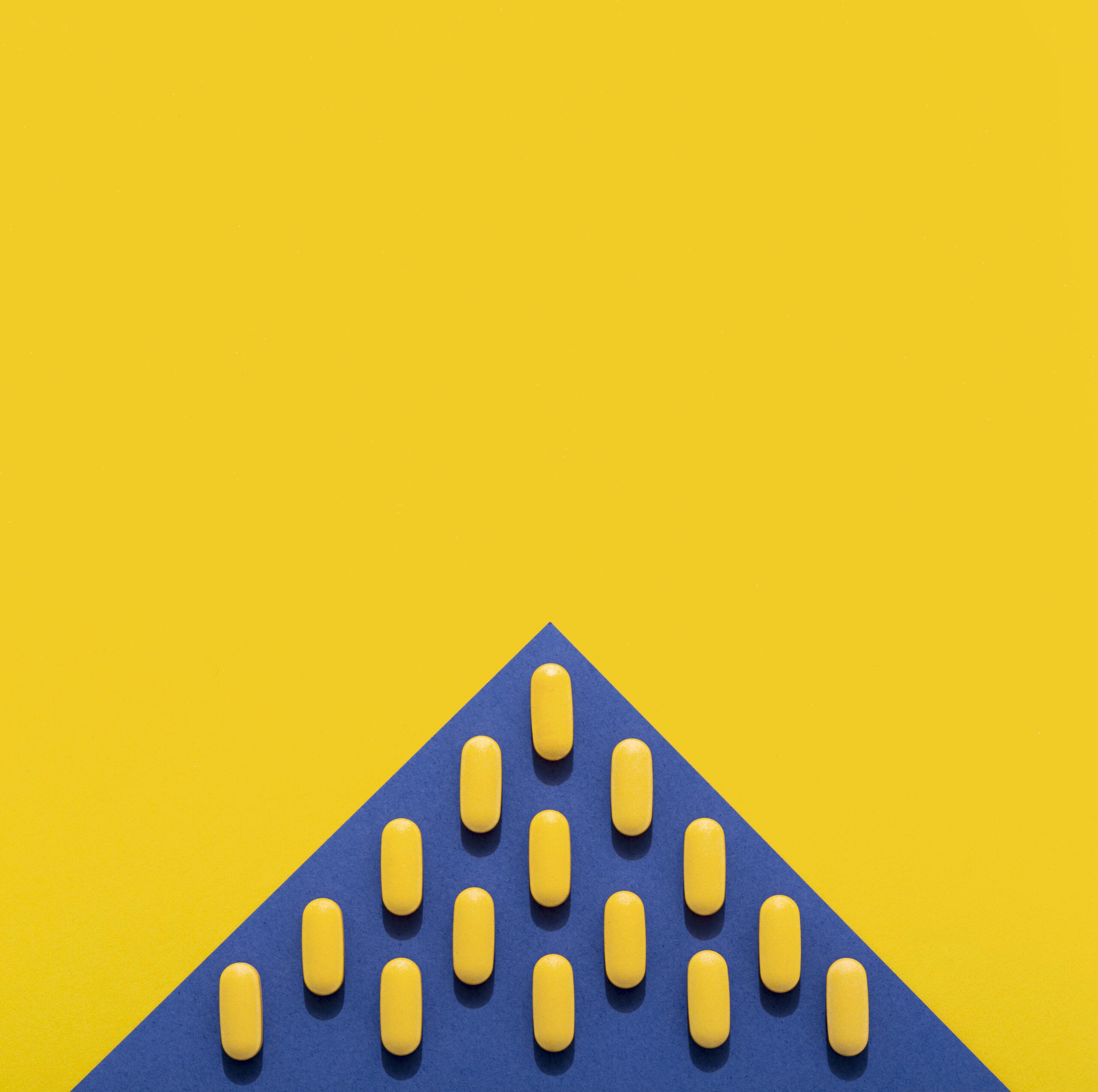 B2B Growth Engine 5 flat lay pills triangle shape with copy space scaled